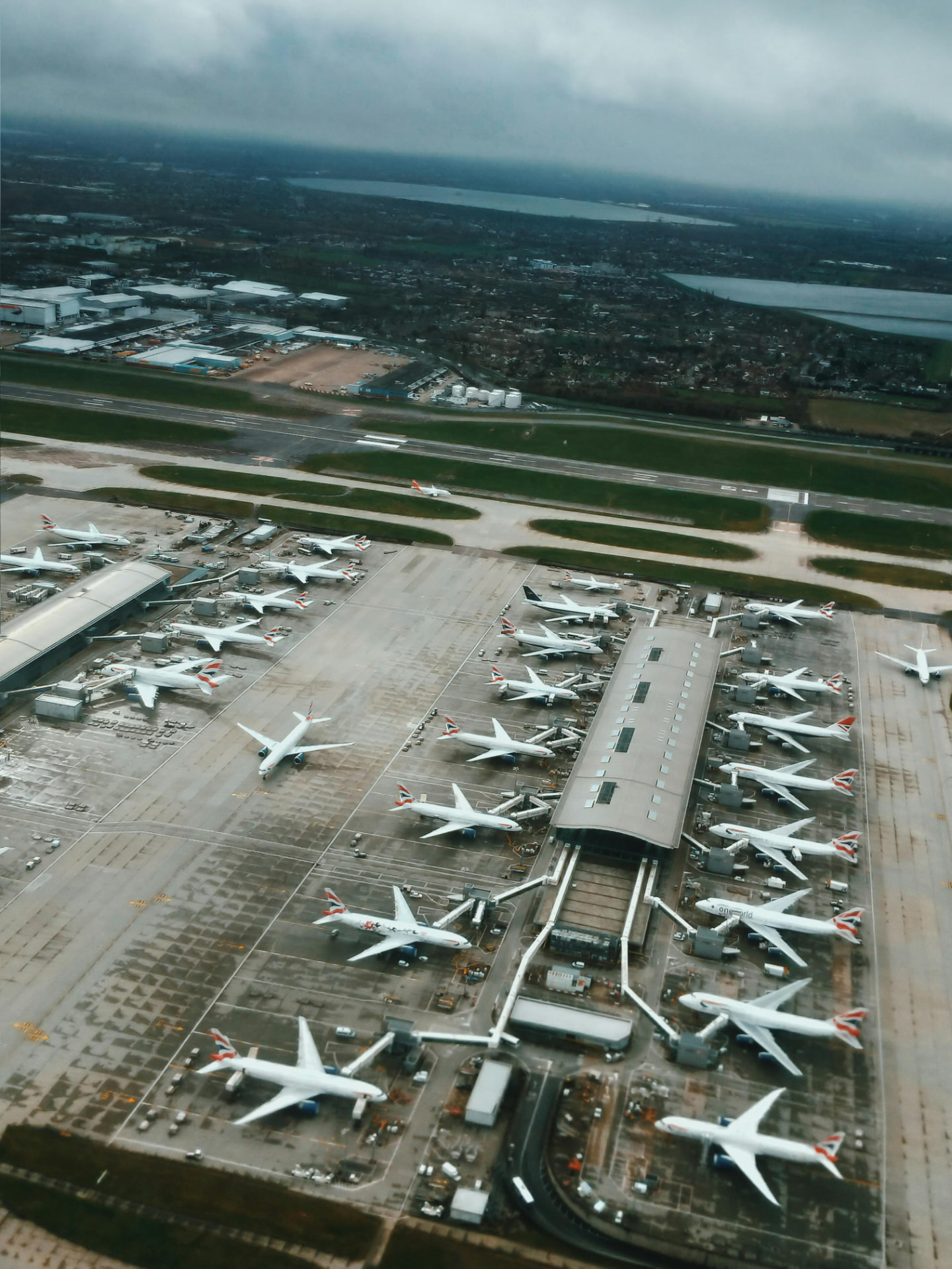 Aerial view of an airport terminal and aircraft